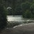 The boat ramp is under water and the parking lot is flooding.