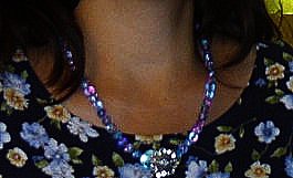 Here is the necklace I made with the flower button.
