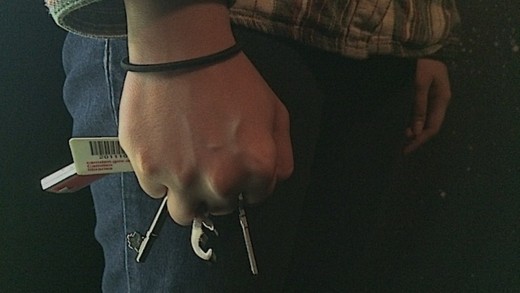 Holding your keys tightly between your fingers in case you are attacked. 
