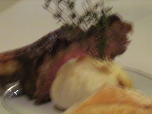 Potatoes were served with the delicious steak.