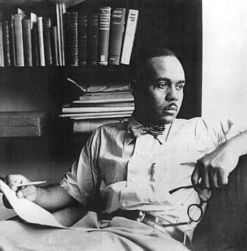 Ellison surrounded by books.