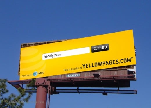 A billboard showing people where they can still find the yellow pages.