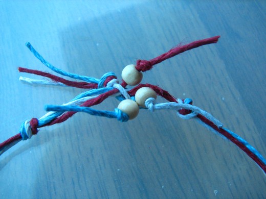 This simple clasp uses loops and knotted beads to adjoin the two ends
