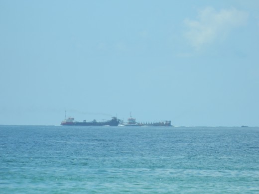 Two freighters changing places