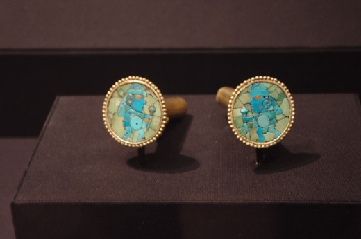 "Pair of Earflares" of Moche (Early Intermediate, 400-600 AD). Made of gold alloy, turquoise, and stone inlay. "Earflares" what the hell? 