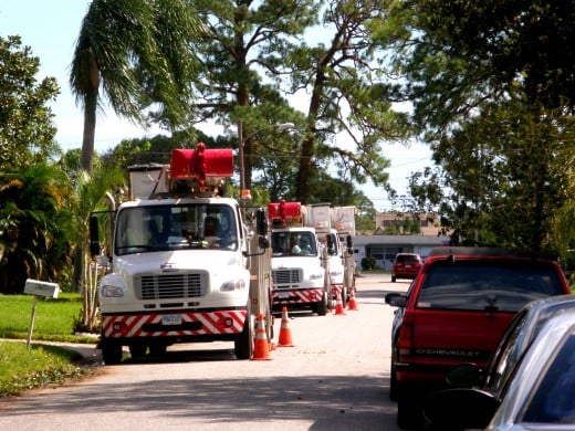 Power trucks and tree-trimming experts line the streets of my neighborhood as they worked to restore power.