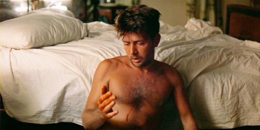 Willard bleeding and mentally unstable in the hotel room. 