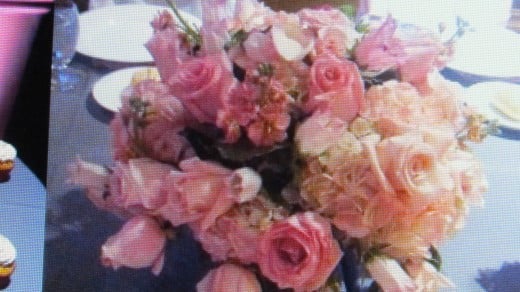 The beautiful bridal bouquet was featured on the table at the reception.