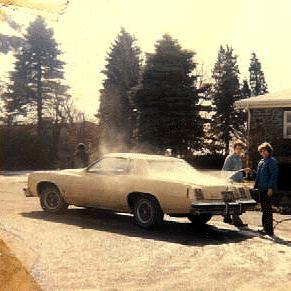 This is a photo of us washing our father's car, but look to the front and see the ghost of the kid that was shoot right on our property in the early Seventies! It's a ghost.