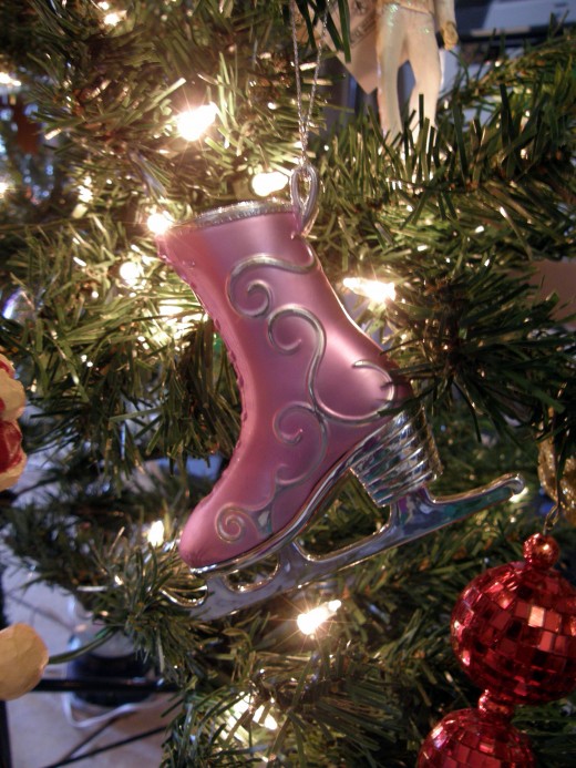 My daughter loves ice-skating and have several ornaments of ice skates on the tree that were given to her.