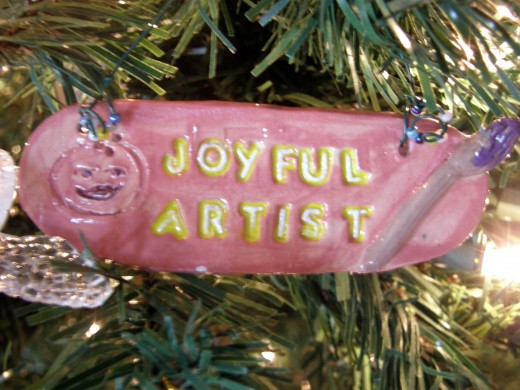 The author is an Artist, and this ornament of clay represents that.