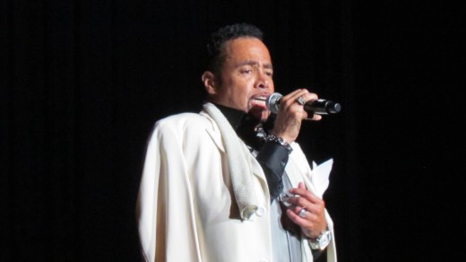 Morris Day, returned to the stage dressed in a white coat after a brief break. 