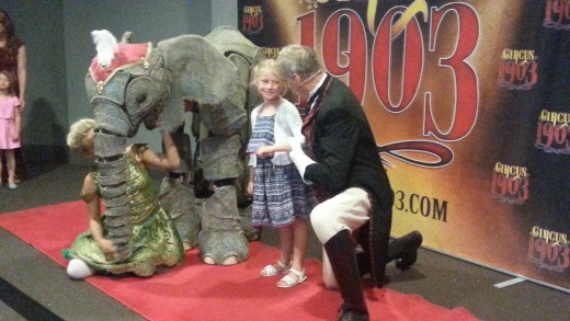 Your children can have a photo taken with the baby elephant and stars of Circus 1903.