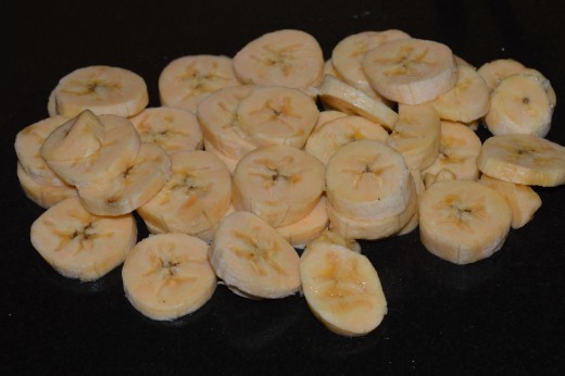 Step one: Peel the ripe plantains. Chop them into medium-thick slices.