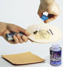 Gluing rubber to racket blade