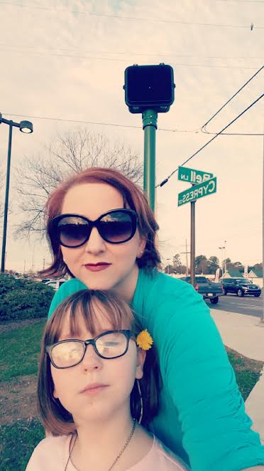 Mr. Orange Hand Traffic Signal did not show up in the picture, no matter how many times we tried to take it. My child's theory is that he had gone to the Inauguration since, no matter what your politics, "parades are fun." 