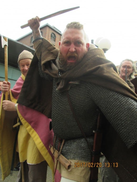 This is Mike in all his finery. That scramaseaxe might be a bit blunt - for show and re-enactment - but I wouldn't willingly test its effectiveness if I were you!