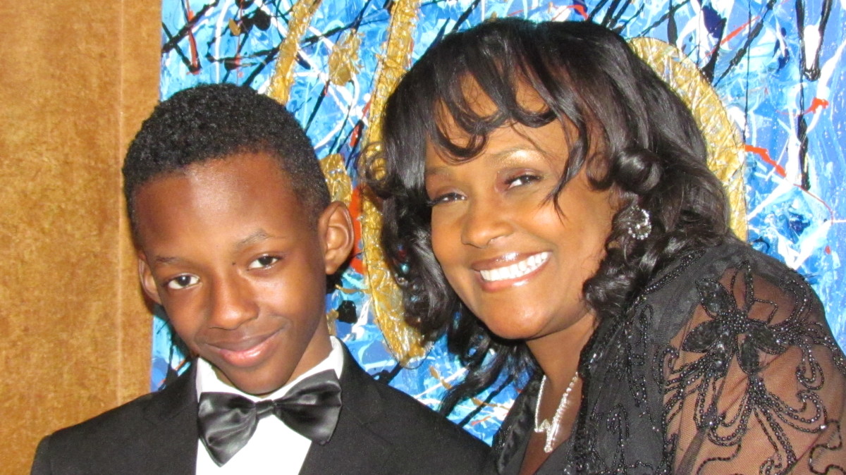 Sheila Coley, and her son Troy Rick, take a quick photo before Sheila's performance of her new CD, "Move With You."