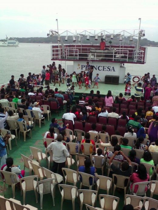 Tourists were in dancing on the dance floor on the cruise