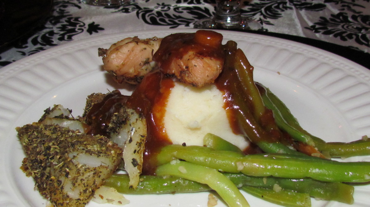 Baked Chicken and fish, with mashed potatoes, gravy and green beans were served for dinner.