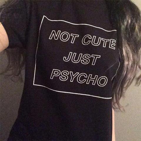 This funny t-shirt with an attitude will make any outfit stand out. A perfect choice for grunge looks, it is designed with a round neck collar and comes in colors black and white.