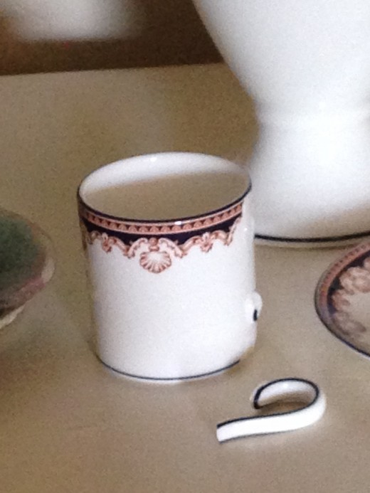 A broken-off cup handle on my Medici demitasse cup. I could cry.