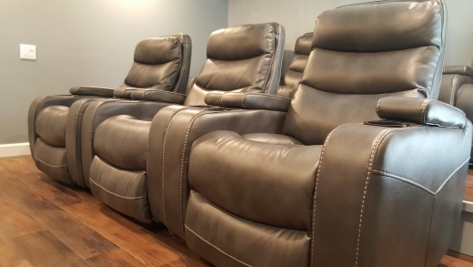 The seating we chose are 10 leather power recliners laid out in 3 rows
