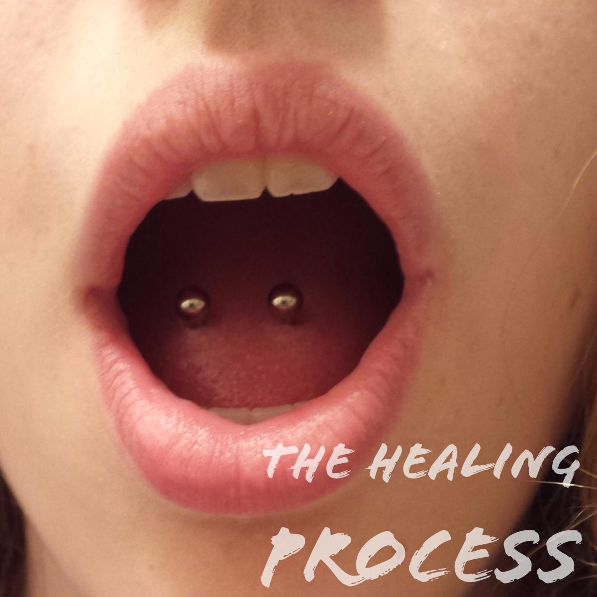 what should a healing tongue piercing look like