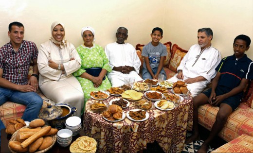 A Moroccan Muslim family waiting to break their fast to Allah in the evening. 