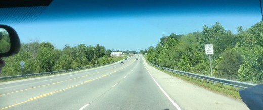 A highway view from the front seat
