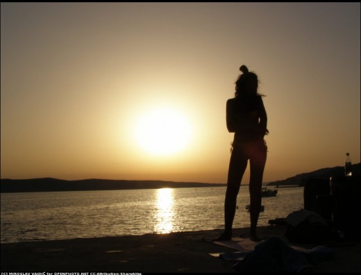 Nice picture of woman, enjoying sunset