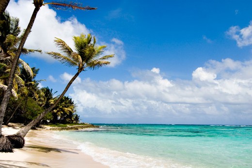 Tiny isle of Marie Galante, soft sandy beaches, balmy warm air, lissom lasses...