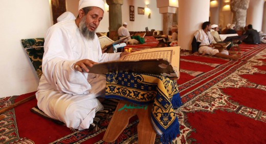 Reading Quran in a mosque during Ramadan. 