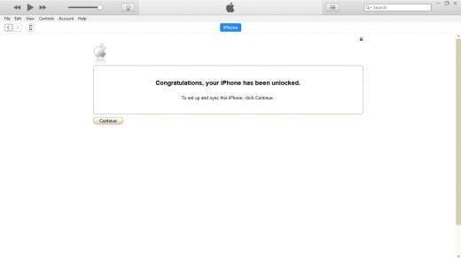 A message appears in the iTunes window saying "Congratulations, your iPhone has been unlocked"