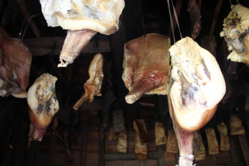 Hams and bacon hang in the smoke house to provide that special taste for southern cooks.