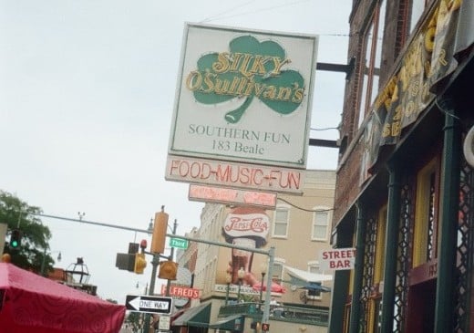 Silky's is an Irish pub on Beale in a 100 year old building with a piano, patio, and BBQ menu