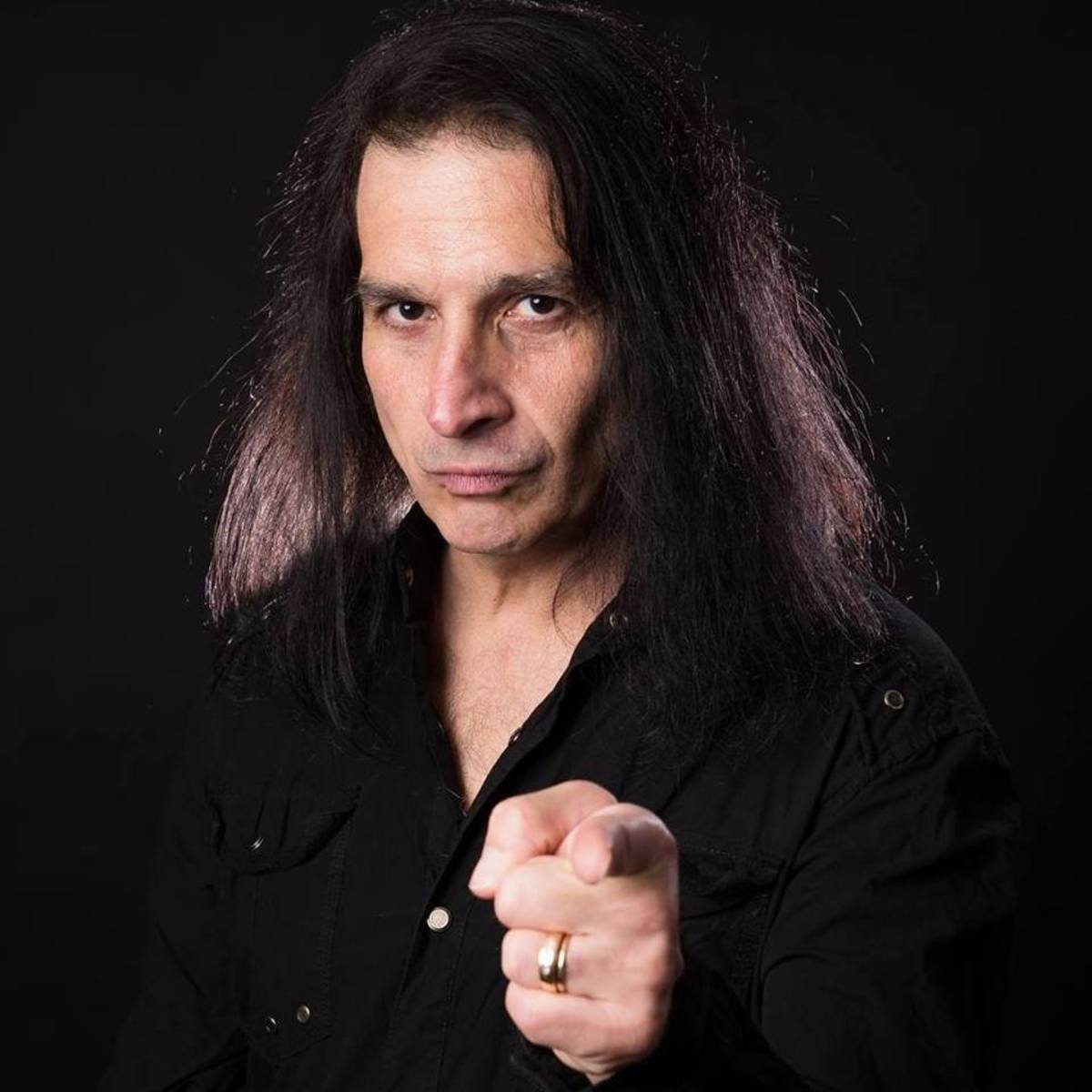 Michael Vescera, the same vocalist that was once a member of the Japanese rock band Loudness performed lead vocals for Yngwie J. Malmsteen on the albums Magnum Opus & The Seventh Sign.