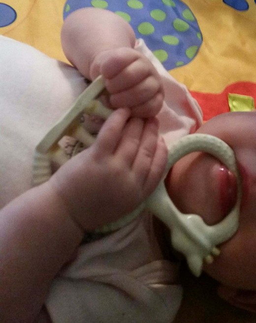 It is best to use soft, yet sturdy teething rings to help baby massage tender gums while teething.