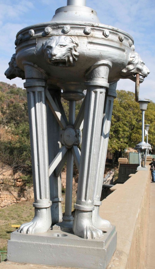 The base of one of the lamp poles on the dam wall