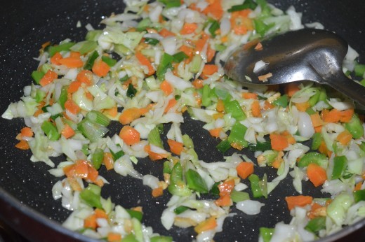 Step three: Throw in all chopped veggies except spring onion greens. Saute for 2 minutes. 