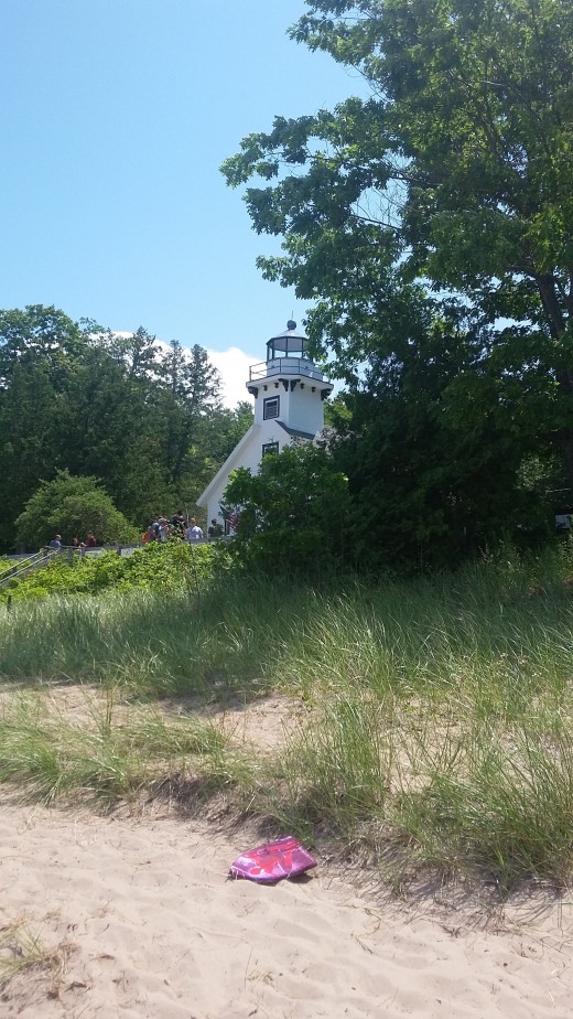 Old Mission Lighthouse is on a Peninsula in Traverse bay, with a public beach