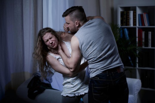 Husband choking wife and beating her.