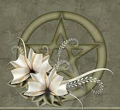 This is a Wiccan pentacle. A pentacle represents the sacred elements of earth, air, fire, water, and spirit.