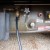 Fitting installed on main propane tank, with hose attached to supply the grill Fitting installed on main propane tank, with hose attached to supply the grill
