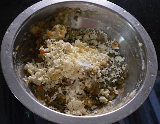 Step two: Chop the veggies as per instructions. Boil and mash them. Put the mix in a bowl. Add grated paneer.