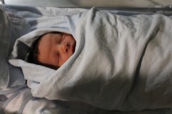 5 Reasons Not to Swaddle Newborns