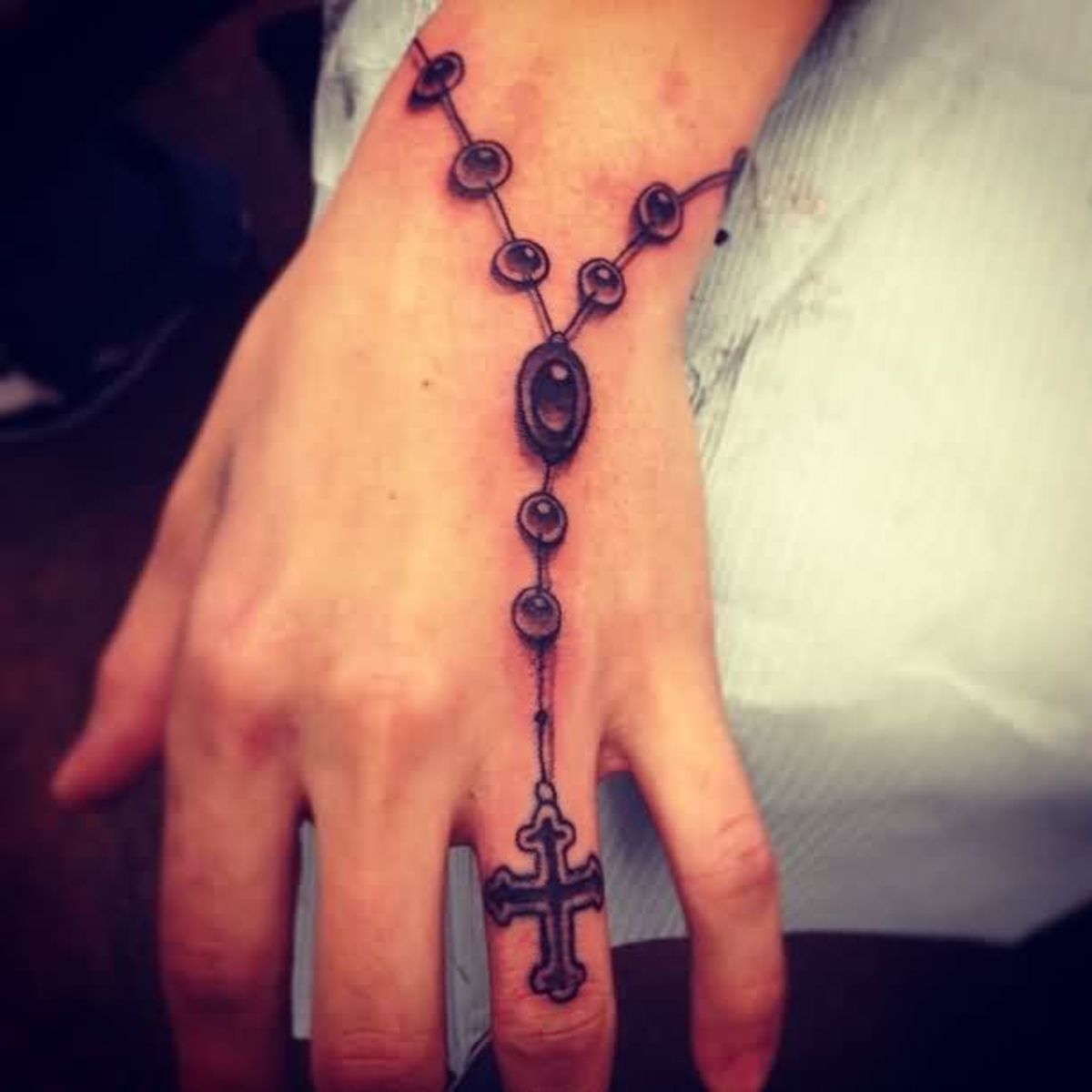 Rosary Bead Tattoo Ideas, Designs, and Meanings | TatRing How To Wear A Rosary Around Your Wrist