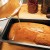 Spread the sugar syrup on top. Spread the sugar syrup on top.