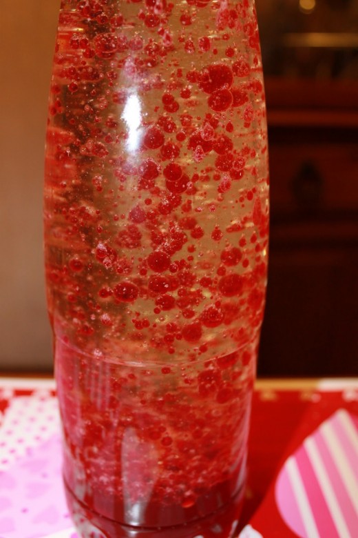 Homemade lava lamp using red food coloring instead of the usual blue