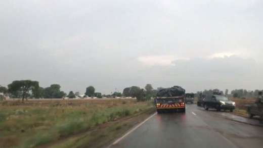 Military vehicles on road in Zimbabwe